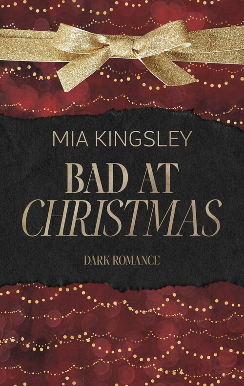 Buchcover des Dark-Romance-Romans „Bad at Christmas“ von Mia Kingsley: Roter Hintergrund mit goldenen Lichtpunkten, oben eine große goldene Schleife, mittig ein schwarzer Papierstreifen mit dem Titel in goldener Schrift.